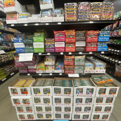 Display of wild bird feed and supplies, including suet cakes, at Mechanicsburg Agway.